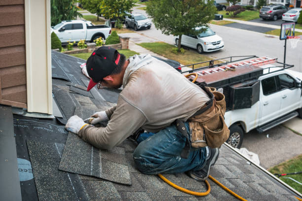 Professional Roof Leak Repair technician working in Hallwood, VA